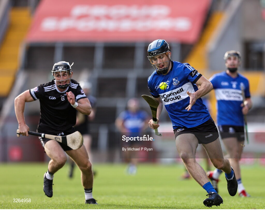 19 October 2025; Barry O'Flynn of Sarsfields in action against Tommy O'Connell of Midleton during the Cork County Senior Club Hurling Championship final match between Sarsfields and Midleton at SuperValu Páirc Uí Chaoimh in Cork. Photo by Michael P Ryan/Sportsfile