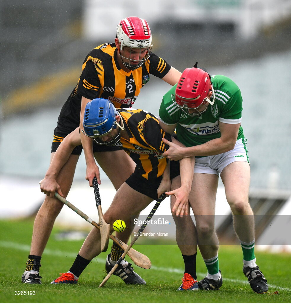 19 October 2025; Keith Dempsey of Na Piarsaigh in action against Ryan Tobin, centre, and James O'Sullivan of Garryspillane during the Limerick Premier Intermediate Hurling final match between Garryspilane and Effin at TUS Gaelic Grounds in Limerick. Photo by Brendan Moran/Sportsfile