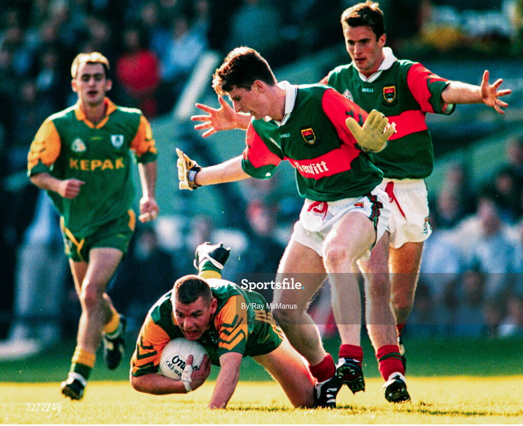 15 September 1996; Tommy Dowd of Meath is tackled by Kevin Cahill of Mayo during the GAA All-Ireland Senior Football Championship Final between Meath and Mayo at Croke Park in Dublin. Photo by Ray McManus/Sportsfile
