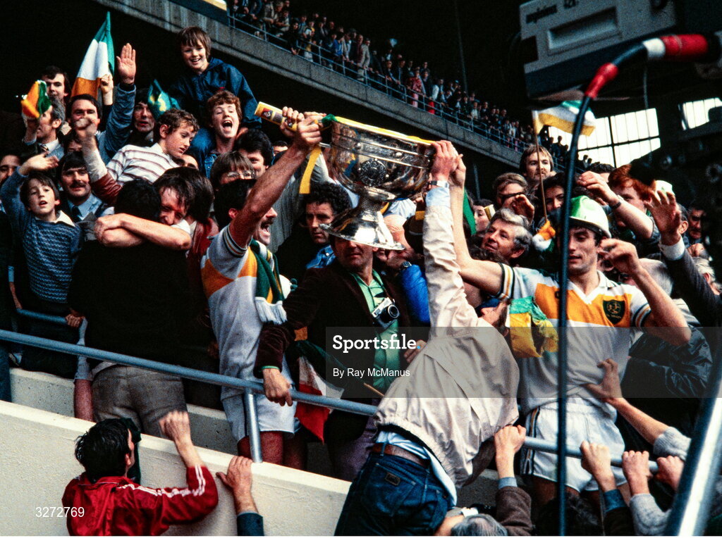 19 September 1982; Offaly players and supporters celebrate with the Sam Maguire cup after victory in the All-Ireland Football Final match between Offaly and Kerry at Croke Park, Dublin. Photo by Ray McManus/Sportsfile
