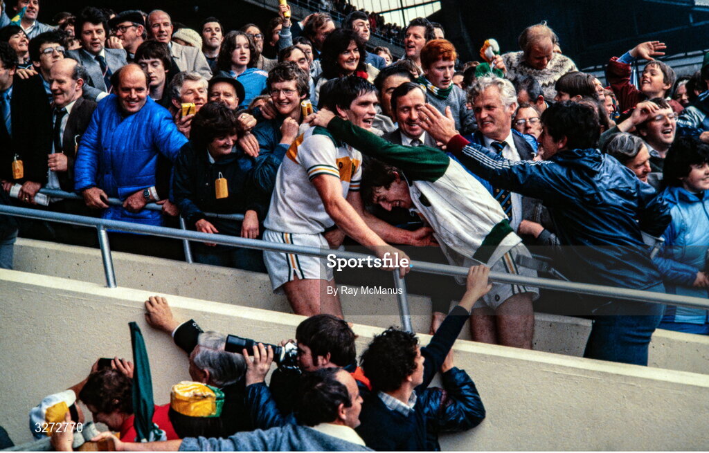 19 September 1982; Offaly captain Richie Connor, left, and Hugh Bolton celebrate with supporters after their side's victory in the All-Ireland Football Final match between Offaly and Kerry at Croke Park, Dublin. Photo by Ray McManus/Sportsfile
