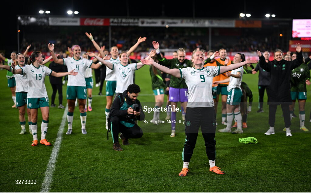 28 October 2025; Republic of Ireland players and staff, including Amber Barrett, centre, celebrate after the UEFA Women's Nations League A/B promotion/relegation play-off second leg match between Belgium and Republic of Ireland at The King Power At Den Dreef Stadium in Leuven, Belgium. Photo by Stephen McCarthy/Sportsfile