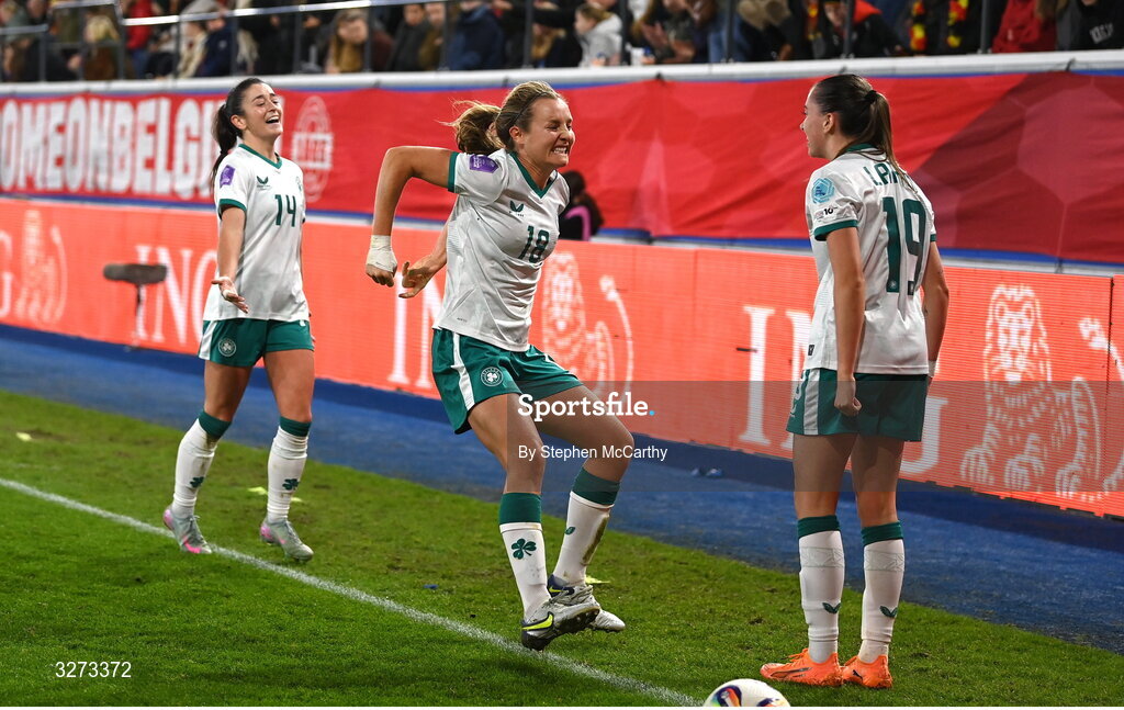 28 October 2025; Abbie Larkin of Republic of Ireland, right, celebrates with Kyra Carusa, centre, and Marissa Sheva at the final whistle of the UEFA Women's Nations League A/B promotion/relegation play-off second leg match between Belgium and Republic of Ireland at The King Power At Den Dreef Stadium in Leuven, Belgium. Photo by Stephen McCarthy/Sportsfile