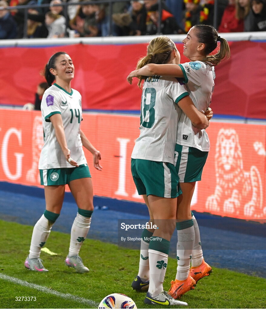 28 October 2025; Abbie Larkin of Republic of Ireland, right, celebrates with Kyra Carusa, centre, and Marissa Sheva at the final whistle of the UEFA Women's Nations League A/B promotion/relegation play-off second leg match between Belgium and Republic of Ireland at The King Power At Den Dreef Stadium in Leuven, Belgium. Photo by Stephen McCarthy/Sportsfile
