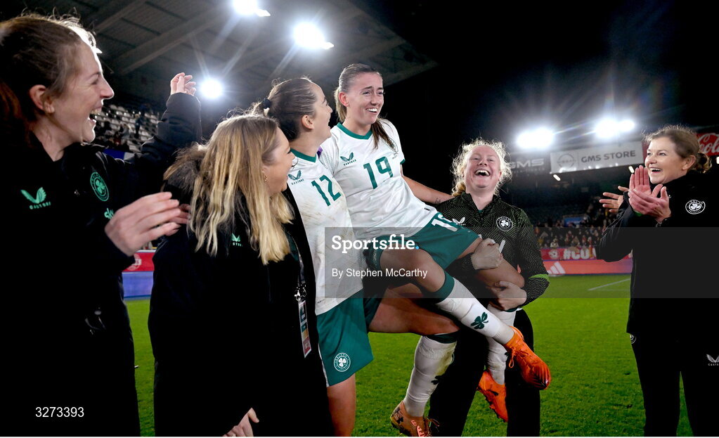 28 October 2025; Abbie Larkin of Republic of Ireland celebrates with her teammates and staff including Anna Patten and Amber Barrett after the UEFA Women's Nations League A/B promotion/relegation play-off second leg match between Belgium and Republic of Ireland at The King Power At Den Dreef Stadium in Leuven, Belgium. Photo by Stephen McCarthy/Sportsfile