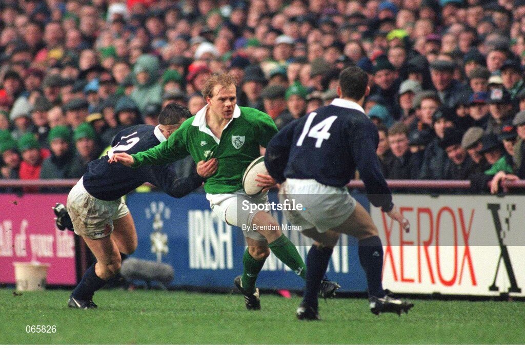 20 January 1996; Simon Geoghegan, Ireland, breaks through the Scotland tackle. Five Nations Rugby Championship, Ireland v Scotland, Lansdowne Road, Dublin. Picture credit: Brendan Moran / SPORTSFILE