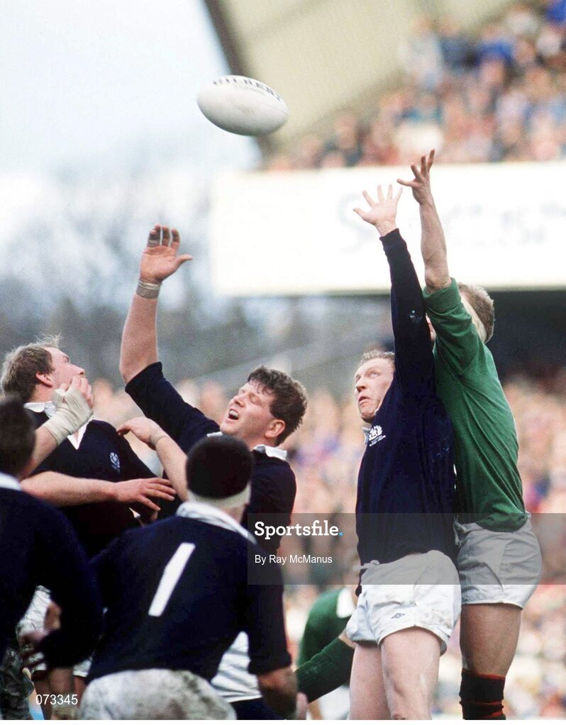 16 March 1991; Ireland's Brian Robinson in action against Scotland's Derek White and Damian Cronin, right. Five Nations Championship 1991, Scotland v Ireland, Murrayfield, Edinburgh, Scotland. Rugby. Picture credit: Ray McManus / SPORTSFILE
