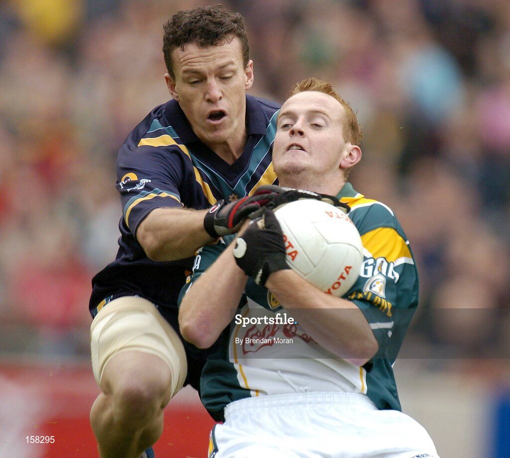 17 October 2004; Brendan Coulter, Ireland, in action against Jared Crouch, Australia. Coca Cola International Rules Series 2004, First Test, Ireland v Australia, Croke Park, Dublin. Picture credit; Brendan Moran / SPORTSFILE *** Local Caption *** Any photograph taken by SPORTSFILE during, or in connection with, the 2004 Coca Cola International Rules Series which displays GAA logos or contains an image or part of an image of any GAA intellectual property, or, which contains images of a GAA player/players in their playing uniforms, may only be used for editorial and non-advertising purposes.  Use of photographs for advertising, as posters or for purchase separately is strictly prohibited unless prior written approval has been obtained from the Gaelic Athletic Association.