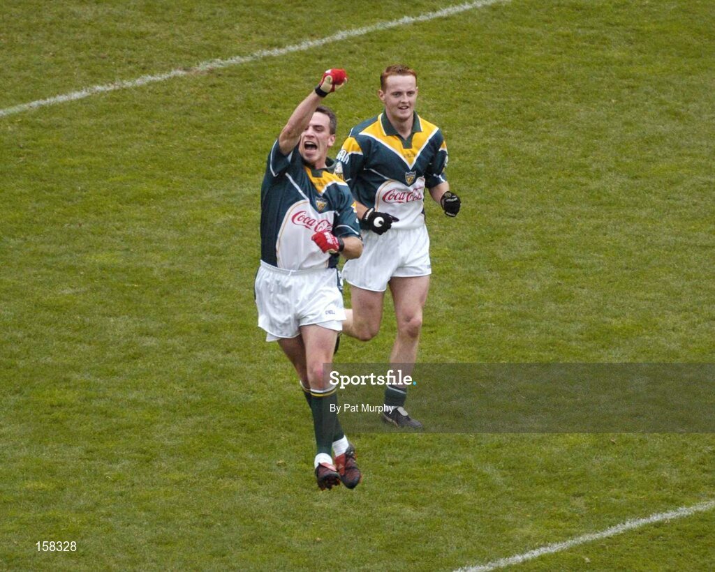 17 October 2004; Padraic Joyce, Ireland, celebrates after scoring a goal for his side. Coca Cola International Rules Series 2004, First Test, Ireland v Australia, Croke Park, Dublin. Picture credit; Pat Murphy / SPORTSFILE *** Local Caption *** Any photograph taken by SPORTSFILE during, or in connection with, the 2004 Coca Cola International Rules Series which displays GAA logos or contains an image or part of an image of any GAA intellectual property, or, which contains images of a GAA player/players in their playing uniforms, may only be used for editorial and non-advertising purposes.  Use of photographs for advertising, as posters or for purchase separately is strictly prohibited unless prior written approval has been obtained from the Gaelic Athletic Association.