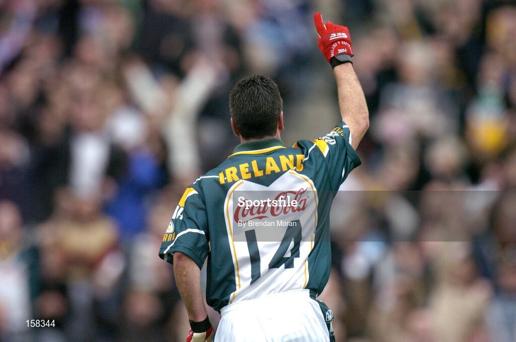 17 October 2004; Padraic Joyce, Ireland, celebrates scoring his sides third goal against Australia. Coca Cola International Rules Series 2004, First Test, Ireland v Australia, Croke Park, Dublin. Picture credit; Brendan Moran / SPORTSFILE *** Local Caption *** Any photograph taken by SPORTSFILE during, or in connection with, the 2004 Coca Cola International Rules Series which displays GAA logos or contains an image or part of an image of any GAA intellectual property, or, which contains images of a GAA player/players in their playing uniforms, may only be used for editorial and non-advertising purposes.  Use of photographs for advertising, as posters or for purchase separately is strictly prohibited unless prior written approval has been obtained from the Gaelic Athletic Association.