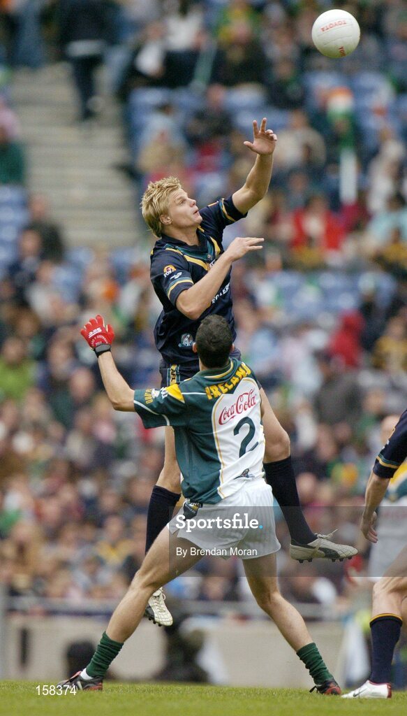 17 October 2004; Nick Riewoldt, Australia, in action against Joe Bergin, Ireland. Coca Cola International Rules Series 2004, First Test, Ireland v Australia, Croke Park, Dublin. Picture credit; Brendan Moran / SPORTSFILE *** Local Caption *** Any photograph taken by SPORTSFILE during, or in connection with, the 2004 Coca Cola International Rules Series which displays GAA logos or contains an image or part of an image of any GAA intellectual property, or, which contains images of a GAA player/players in their playing uniforms, may only be used for editorial and non-advertising purposes.  Use of photographs for advertising, as posters or for purchase separately is strictly prohibited unless prior written approval has been obtained from the Gaelic Athletic Association.