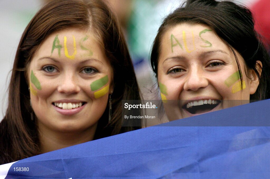 17 October 2004; Australian fans cheer on their side during the game. Coca Cola International Rules Series 2004, First Test, Ireland v Australia, Croke Park, Dublin. Picture credit; Brendan Moran / SPORTSFILE *** Local Caption *** Any photograph taken by SPORTSFILE during, or in connection with, the 2004 Coca Cola International Rules Series which displays GAA logos or contains an image or part of an image of any GAA intellectual property, or, which contains images of a GAA player/players in their playing uniforms, may only be used for editorial and non-advertising purposes.  Use of photographs for advertising, as posters or for purchase separately is strictly prohibited unless prior written approval has been obtained from the Gaelic Athletic Association.