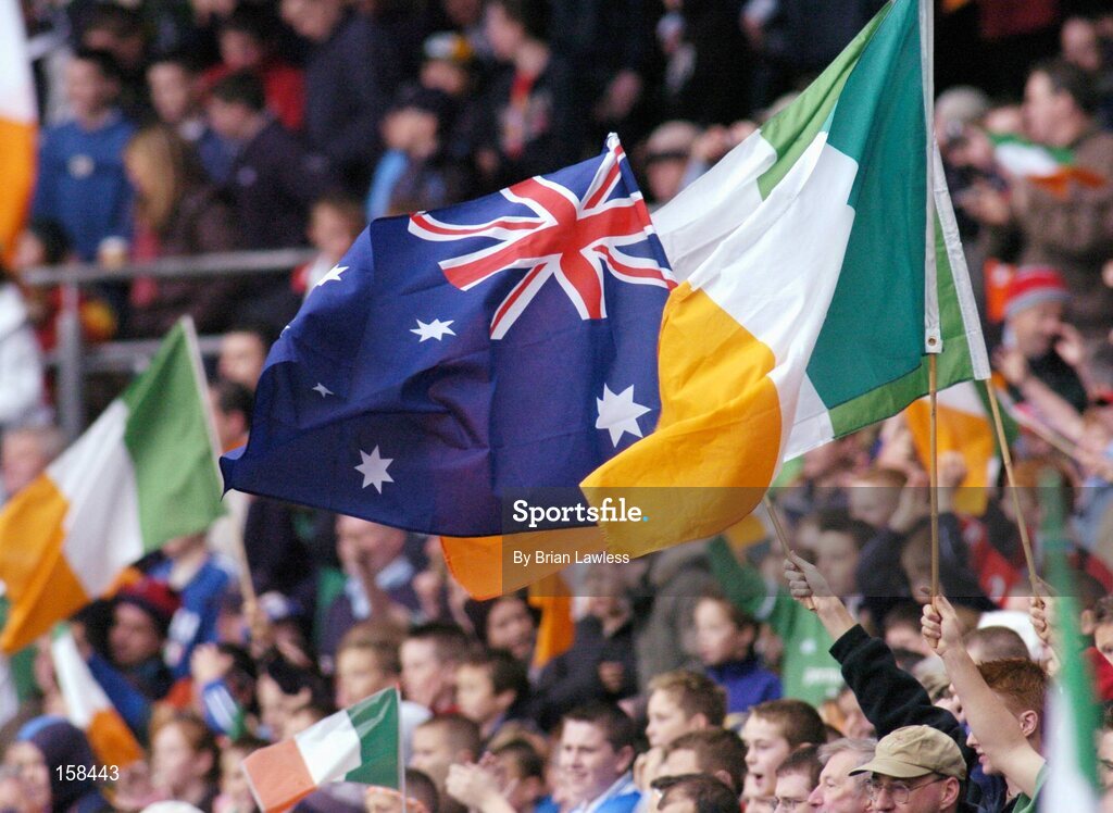 17 October 2004; The Irish and Australian flags fly during the game. Coca Cola International Rules Series 2004, First Test, Ireland v Australia, Croke Park, Dublin. Picture credit; Brian Lawless / SPORTSFILE *** Local Caption *** Any photograph taken by SPORTSFILE during, or in connection with, the 2004 Coca Cola International Rules Series which displays GAA logos or contains an image or part of an image of any GAA intellectual property, or, which contains images of a GAA player/players in their playing uniforms, may only be used for editorial and non-advertising purposes.  Use of photographs for advertising, as posters or for purchase separately is strictly prohibited unless prior written approval has been obtained from the Gaelic Athletic Association.