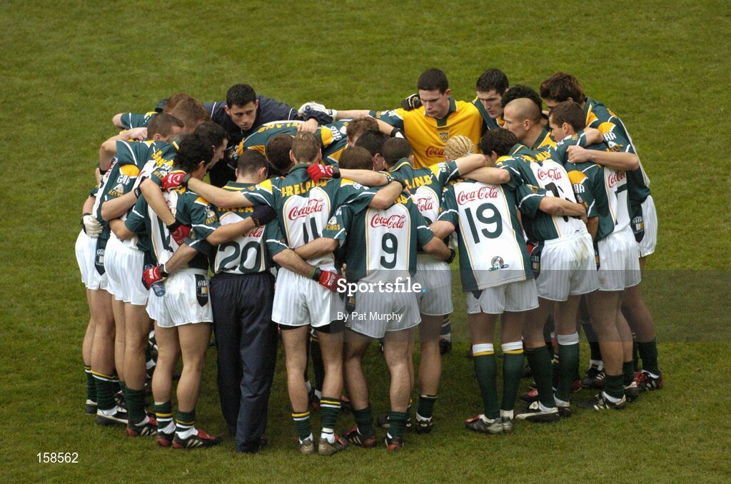 17 October 2004; The Ireland players in a team huddle before the game. Coca Cola International Rules Series 2004, First Test, Ireland v Australia, Croke Park, Dublin. Picture credit; Pat Murphy / SPORTSFILE *** Local Caption *** Any photograph taken by SPORTSFILE during, or in connection with, the 2004 Coca Cola International Rules Series, which displays GAA logos or contains an image or part of an image of any GAA intellectual property, or, which contains images of a GAA player/players in their playing uniforms, may only be used for editorial and non-advertising purposes.  Use of photographs for advertising, as posters or for purchase separately is strictly prohibited unless prior written approval has been obtained from the Gaelic Athletic Association.