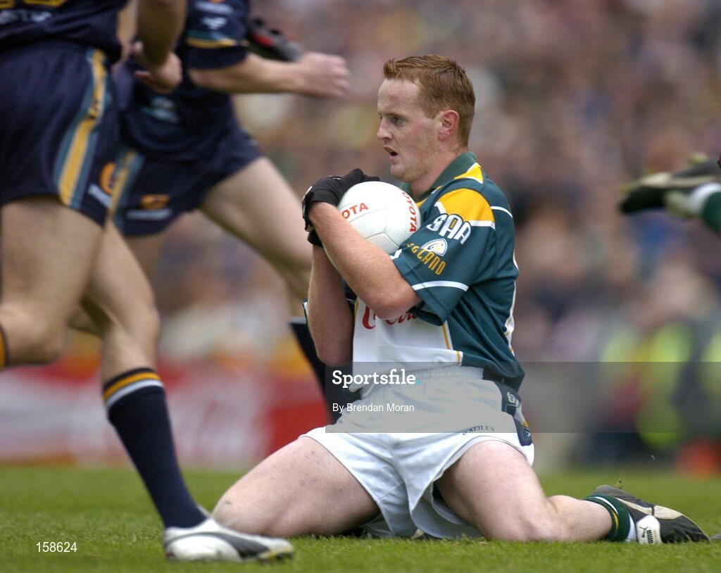 17 October 2004; Brendan Coulter, Ireland, gets a mark against Australia. Coca Cola International Rules Series 2004, First Test, Ireland v Australia, Croke Park, Dublin. Picture credit; Brendan Moran / SPORTSFILE *** Local Caption *** Any photograph taken by SPORTSFILE during, or in connection with, the 2004 Coca Cola International Rules Series which displays GAA logos or contains an image or part of an image of any GAA intellectual property, or, which contains images of a GAA player/players in their playing uniforms, may only be used for editorial and non-advertising purposes.  Use of photographs for advertising, as posters or for purchase separately is strictly prohibited unless prior written approval has been obtained from the Gaelic Athletic Association.
