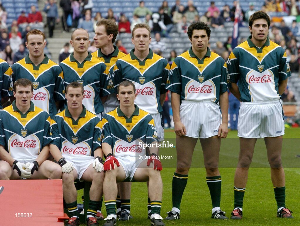 17 October 2004; Ireland's Setanta O hAilpin, right, stands next to his brother Sean Og and the rest of the Irish team during the team photograph. Coca Cola International Rules Series 2004, First Test, Ireland v Australia, Croke Park, Dublin. Picture credit; Brendan Moran / SPORTSFILE *** Local Caption *** Any photograph taken by SPORTSFILE during, or in connection with, the 2004 Coca Cola International Rules Series which displays GAA logos or contains an image or part of an image of any GAA intellectual property, or, which contains images of a GAA player/players in their playing uniforms, may only be used for editorial and non-advertising purposes.  Use of photographs for advertising, as posters or for purchase separately is strictly prohibited unless prior written approval has been obtained from the Gaelic Athletic Association.
