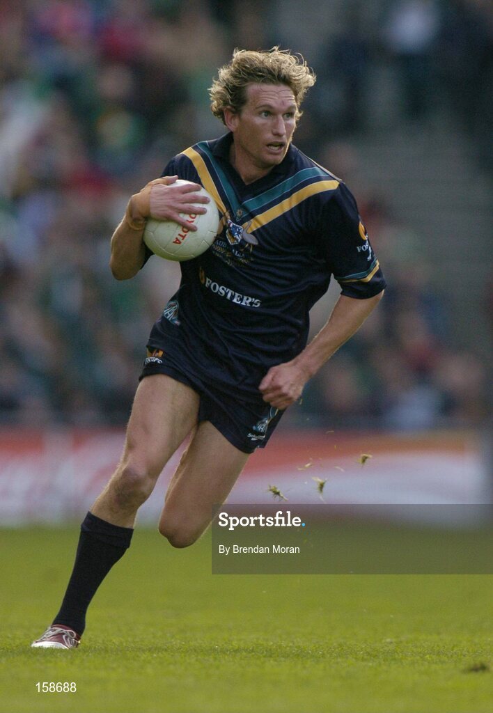17 October 2004; James Hird, Australia. Coca Cola International Rules Series 2004, First Test, Ireland v Australia, Croke Park, Dublin. Picture credit; Brendan Moran / SPORTSFILE *** Local Caption *** Any photograph taken by SPORTSFILE during, or in connection with, the 2004 Coca Cola International Rules Series which displays GAA logos or contains an image or part of an image of any GAA intellectual property, or, which contains images of a GAA player/players in their playing uniforms, may only be used for editorial and non-advertising purposes.  Use of photographs for advertising, as posters or for purchase separately is strictly prohibited unless prior written approval has been obtained from the Gaelic Athletic Association.