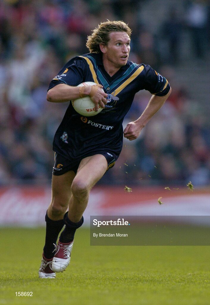 17 October 2004; James Hird, Australia. Coca Cola International Rules Series 2004, First Test, Ireland v Australia, Croke Park, Dublin. Picture credit; Brendan Moran / SPORTSFILE *** Local Caption *** Any photograph taken by SPORTSFILE during, or in connection with, the 2004 Coca Cola International Rules Series which displays GAA logos or contains an image or part of an image of any GAA intellectual property, or, which contains images of a GAA player/players in their playing uniforms, may only be used for editorial and non-advertising purposes.  Use of photographs for advertising, as posters or for purchase separately is strictly prohibited unless prior written approval has been obtained from the Gaelic Athletic Association.