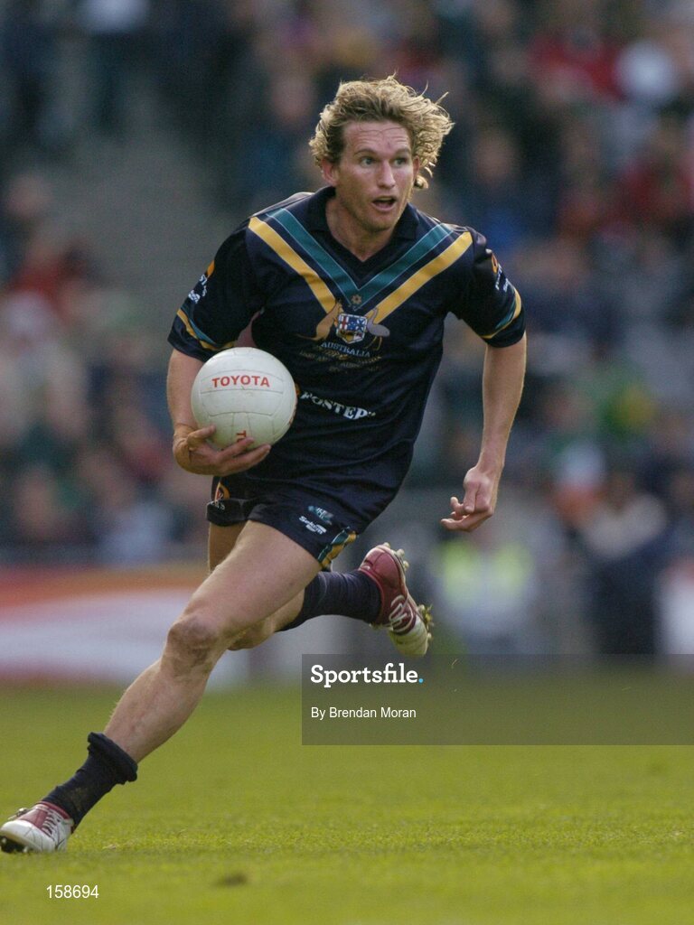 17 October 2004; James Hird, Australia. Coca Cola International Rules Series 2004, First Test, Ireland v Australia, Croke Park, Dublin. Picture credit; Brendan Moran / SPORTSFILE *** Local Caption *** Any photograph taken by SPORTSFILE during, or in connection with, the 2004 Coca Cola International Rules Series which displays GAA logos or contains an image or part of an image of any GAA intellectual property, or, which contains images of a GAA player/players in their playing uniforms, may only be used for editorial and non-advertising purposes.  Use of photographs for advertising, as posters or for purchase separately is strictly prohibited unless prior written approval has been obtained from the Gaelic Athletic Association.