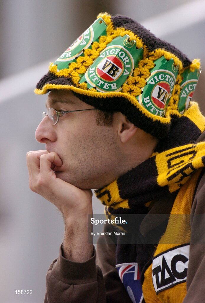 17 October 2004; An Australian supporter watches his side in their defeat to Ireland. Coca Cola International Rules Series 2004, First Test, Ireland v Australia, Croke Park, Dublin. Picture credit; Brendan Moran / SPORTSFILE *** Local Caption *** Any photograph taken by SPORTSFILE during, or in connection with, the 2004 Coca Cola International Rules Series which displays GAA logos or contains an image or part of an image of any GAA intellectual property, or, which contains images of a GAA player/players in their playing uniforms, may only be used for editorial and non-advertising purposes.  Use of photographs for advertising, as posters or for purchase separately is strictly prohibited unless prior written approval has been obtained from the Gaelic Athletic Association.