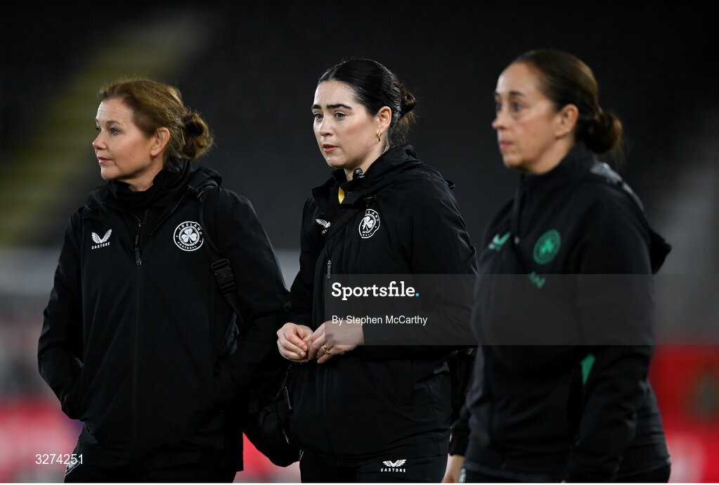 28 October 2025; Republic of Ireland physiotherapist Susie Coffey, centre, with performance nutritionist Olivia Patel, right, and team doctor Siobhan Forman, left, before the UEFA Women's Nations League A/B promotion/relegation play-off second leg match between Belgium and Republic of Ireland at The King Power At Den Dreef Stadium in Leuven, Belgium. Photo by Stephen McCarthy/Sportsfile
