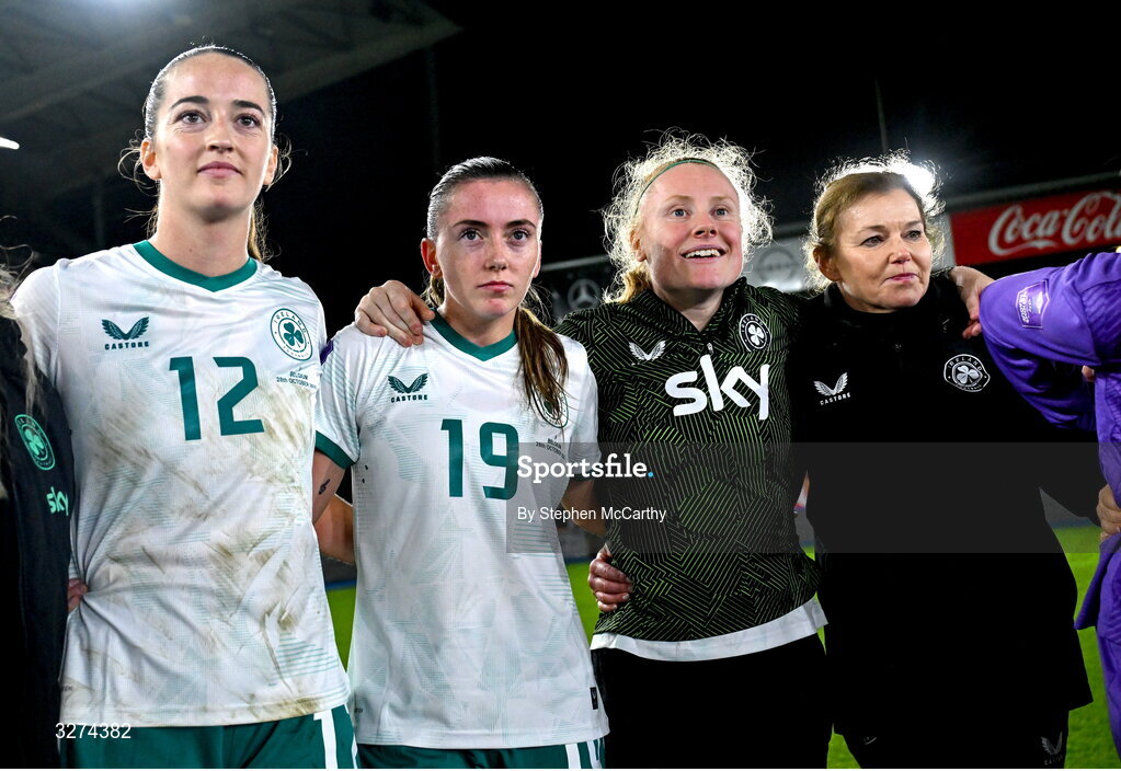 28 October 2025; Republic of Ireland players, from left, Anna Patten, Abbie Larkin, Amber Barrett and team doctor Siobhan Forman after the UEFA Women's Nations League A/B promotion/relegation play-off second leg match between Belgium and Republic of Ireland at The King Power At Den Dreef Stadium in Leuven, Belgium. Photo by Stephen McCarthy/Sportsfile