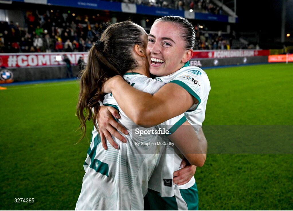 28 October 2025; Republic of Ireland's Abbie Larkin, right, and Anna Patten celebrate after the UEFA Women's Nations League A/B promotion/relegation play-off second leg match between Belgium and Republic of Ireland at The King Power At Den Dreef Stadium in Leuven, Belgium. Photo by Stephen McCarthy/Sportsfile
