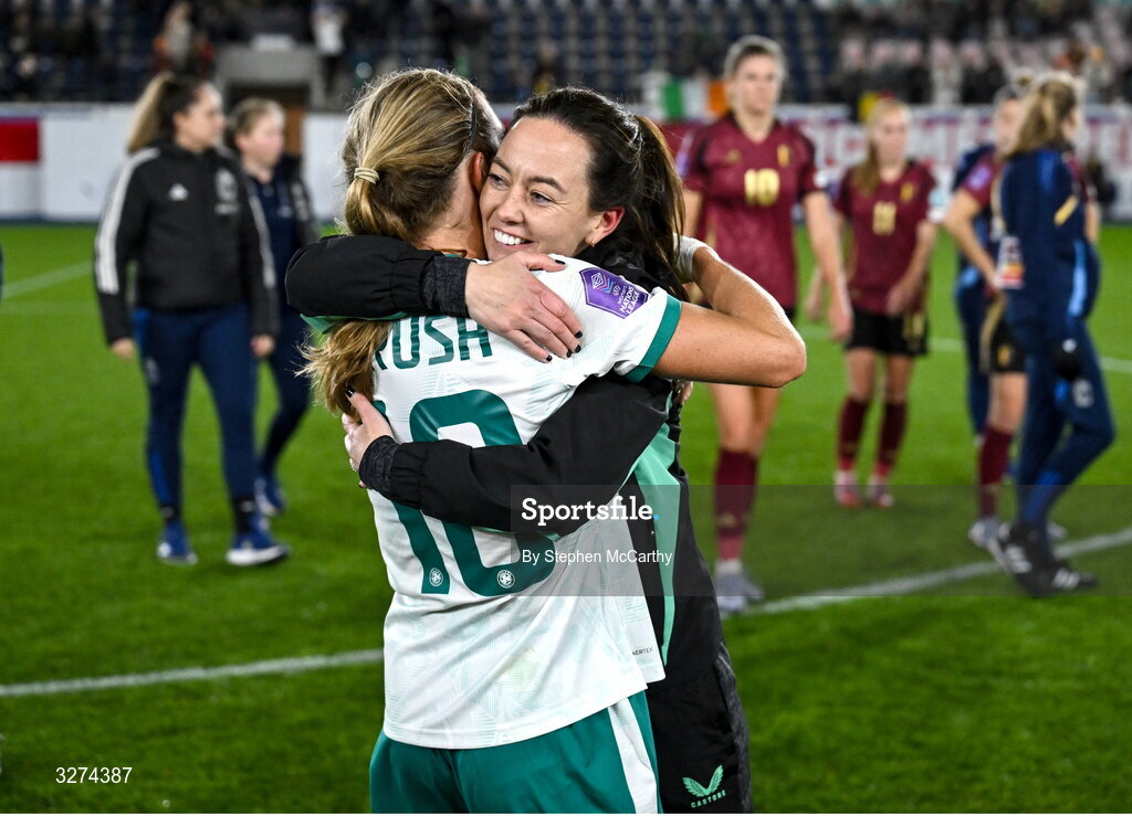 28 October 2025; Republic of Ireland assistant coach Amber Whiteley and Kyra Carusa celebrate after the UEFA Women's Nations League A/B promotion/relegation play-off second leg match between Belgium and Republic of Ireland at The King Power At Den Dreef Stadium in Leuven, Belgium. Photo by Stephen McCarthy/Sportsfile