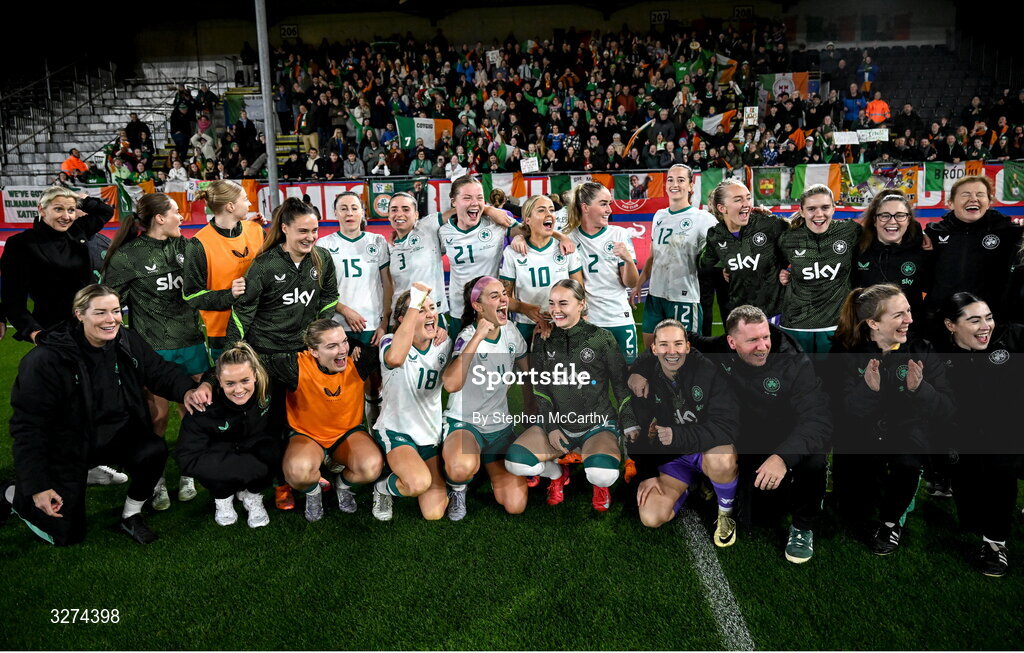 28 October 2025; Republic of Ireland players and staff celebrate after the UEFA Women's Nations League A/B promotion/relegation play-off second leg match between Belgium and Republic of Ireland at The King Power At Den Dreef Stadium in Leuven, Belgium. Photo by Stephen McCarthy/Sportsfile