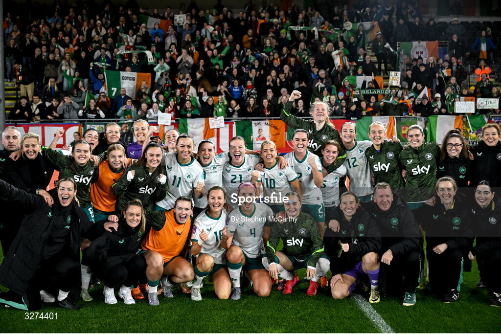 28 October 2025; Republic of Ireland players and staff celebrate after the UEFA Women's Nations League A/B promotion/relegation play-off second leg match between Belgium and Republic of Ireland at The King Power At Den Dreef Stadium in Leuven, Belgium. Photo by Stephen McCarthy/Sportsfile