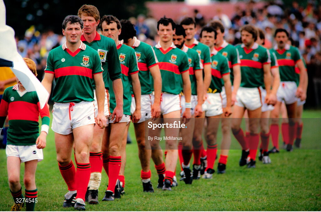 14 July 1985; Mayo captain Henry Gavin of Mayo leads his team in the parade before the Connacht GAA Football Senior Championship Final match between Roscommon and Mayo at Dr Hyde Park in Roscommon. Photo by Ray McManus/Sportsfile