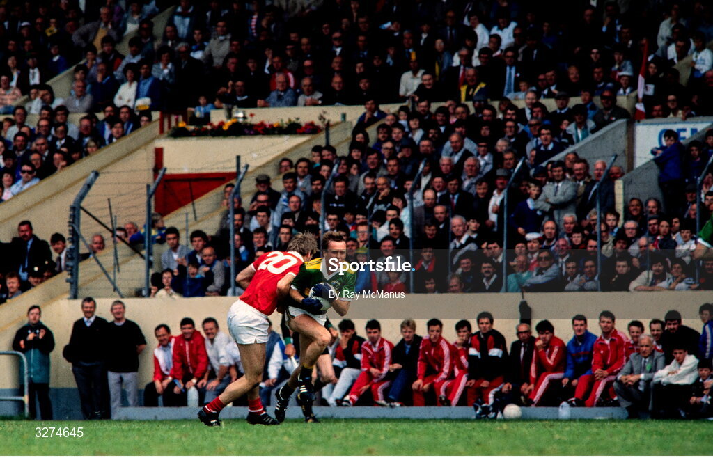 3 July 1988; Ger Lynch of Kerry is tackled by Colm O'Neill of Cork during the Munster Senior Football Championship Final match between Cork and Kerry at Páirc Uí Chaoimh in Cork. Photo by Ray McManus/Sportsfile