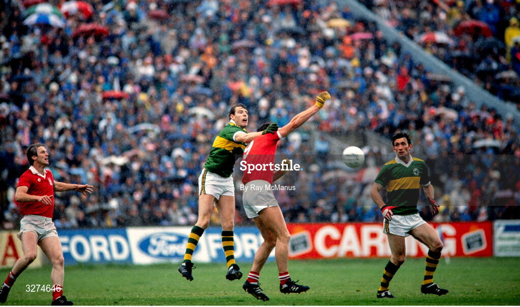 3 July 1988; Dermot Hanafin of Kerry and Shay Fahy of Cork contest a kickout, watched by Larry Tompkins of Cork, left, and Ambrose O'Donovan of Kerry, during the Munster Senior Football Championship Final match between Cork and Kerry at Páirc Uí Chaoimh in Cork. Photo by Ray McManus/Sportsfile