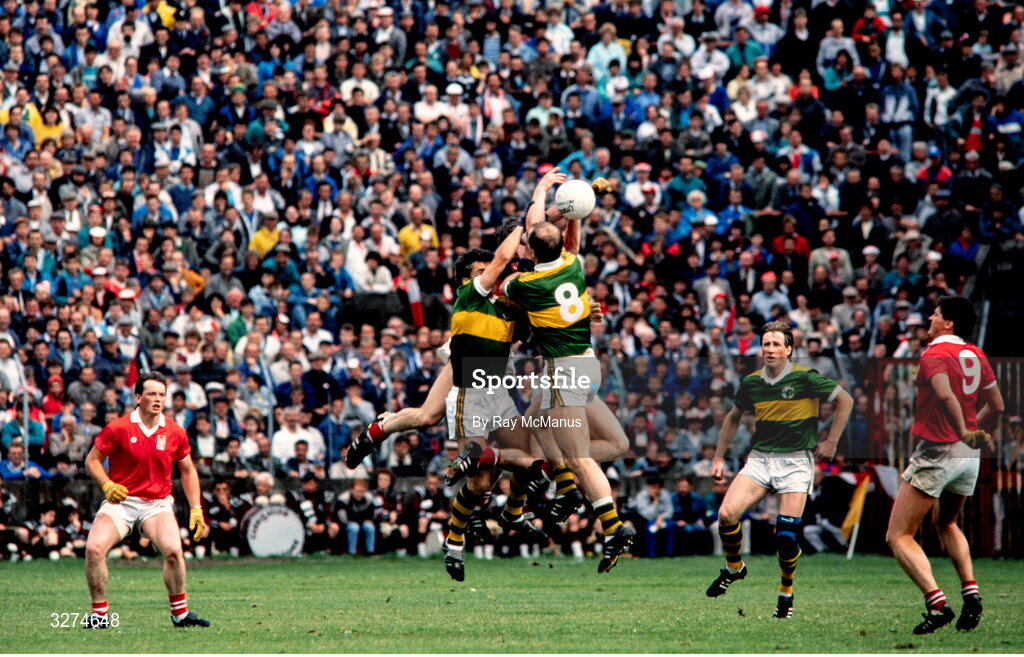 3 July 1988; Kerry players Ambrose O'Donovan and Kack O'Shea, 8, contest a kickout with Cork players during the Munster Senior Football Championship Final match between Cork and Kerry at Páirc Uí Chaoimh in Cork. Photo by Ray McManus/Sportsfile