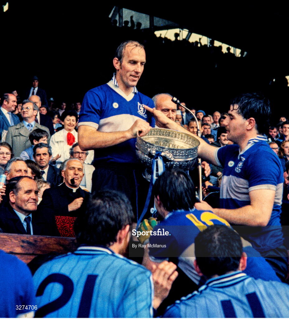 28 July 1985; Dublin captain Brian Mullins, wearing a Laois jersey, with teammate Joe McNally, right, after the Leinster Senior Football Championship Final match between Dublin and Laois at Croke Park in Dublin. Photo by Ray McManus/Sportsfile