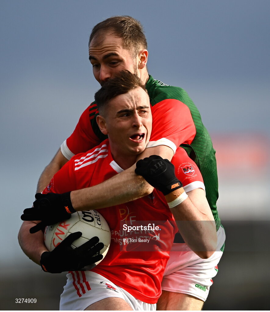 1 November 2025; Eoin Colleran of Pádraig Pearses is tackled by Ruairí Smith of St Brigid's during the Roscommon County Senior Club Football Championship Final Replay between St Brigid's and Pádraig Pearses at King & Moffatt Dr Hyde Park in Roscommon. Photo by Tom Beary/Sportsfile