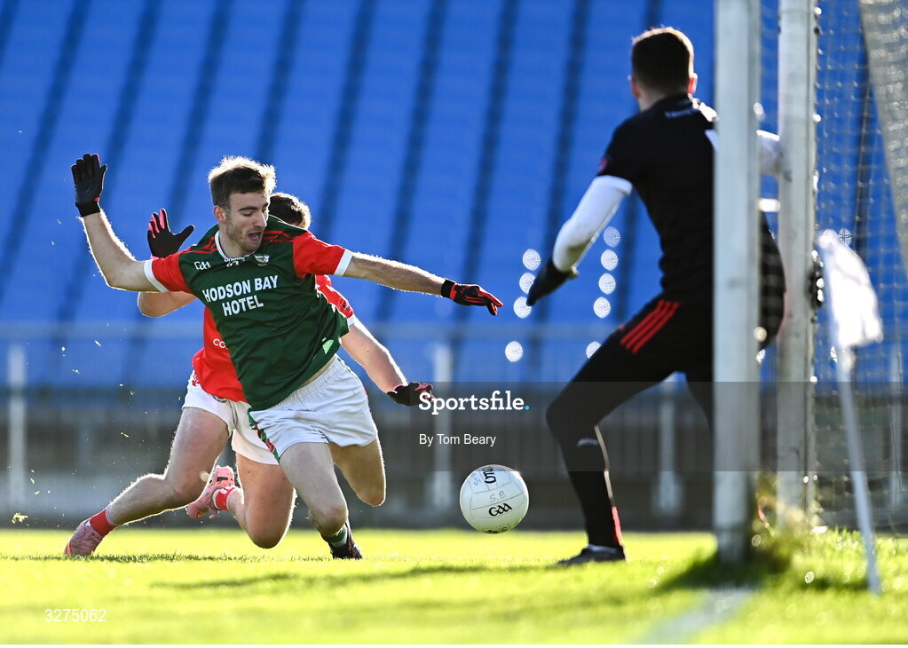 1 November 2025; Paul McGrath of St Brigid's is tackled by Conor Lohan of Pádraig Pearses during the Roscommon County Senior Club Football Championship Final Replay between St Brigid's and Pádraig Pearses at King & Moffatt Dr Hyde Park in Roscommon. Photo by Tom Beary/Sportsfile