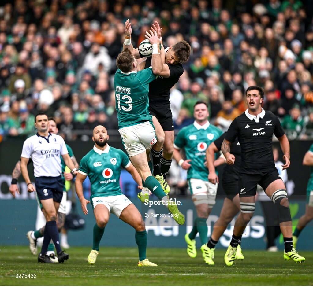 1 November 2025; Garry Ringrose of Ireland in action against Beauden Barrett of New Zealand during the Gallagher Cup match between Ireland and New Zealand at Soldier Field in Chicago, USA. Photo by Ramsey Cardy/Sportsfile