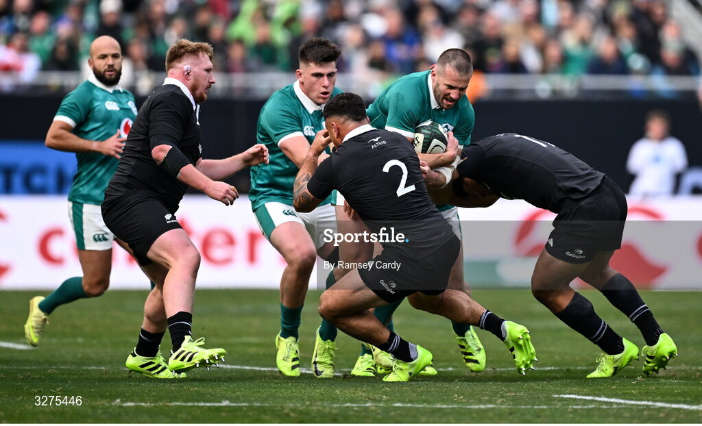 1 November 2025; Stuart McCloskey of Ireland is tackled by Codie Taylor, centre, and Caleb Clarke of New Zealand during the Gallagher Cup match between Ireland and New Zealand at Soldier Field in Chicago, USA. Photo by Ramsey Cardy/Sportsfile