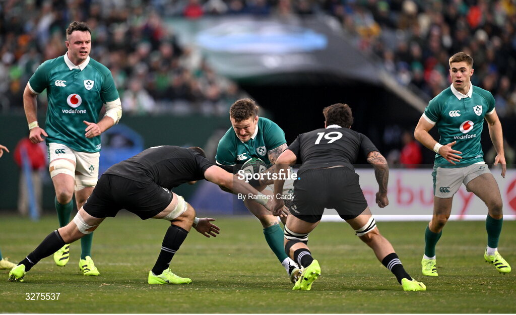 1 November 2025; Andrew Porter of Ireland is tackled by Simon Parker, left, and Josh Lord of New Zealand during the Gallagher Cup match between Ireland and New Zealand at Soldier Field in Chicago, USA. Photo by Ramsey Cardy/Sportsfile