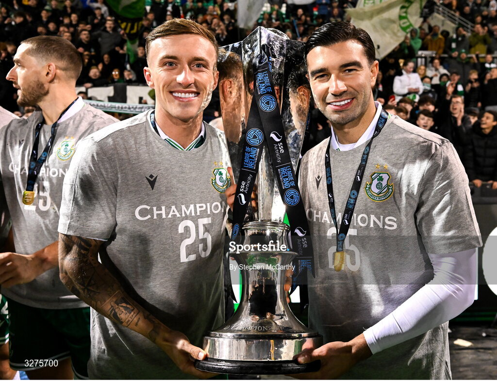 1 November 2025; Danny Grant, left, and Danny Mandroiu of Shamrock Rovers celebrate with the SSE Airtricity Men's Premier Division trophy after the SSE Airtricity Men's Premier Division match between Shamrock Rovers and Sligo Rovers at Tallaght Stadium in Dublin. Photo by Stephen McCarthy/Sportsfile