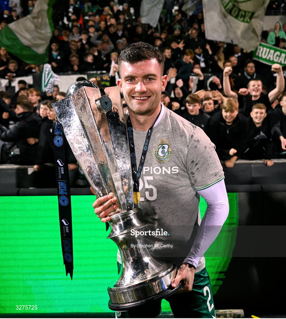 1 November 2025; Josh Honohan of Shamrock Rovers celebrates with the SSE Airtricity Men's Premier Division trophy after the SSE Airtricity Men's Premier Division match between Shamrock Rovers and Sligo Rovers at Tallaght Stadium in Dublin.  Photo by Stephen McCarthy/Sportsfile