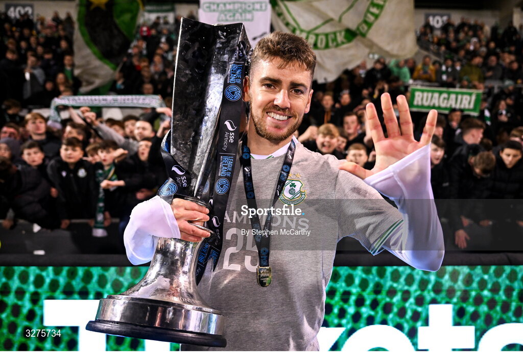 1 November 2025; Dylan Watts of Shamrock Rovers celebrates with the SSE Airtricity Men's Premier Division trophy after the SSE Airtricity Men's Premier Division match between Shamrock Rovers and Sligo Rovers at Tallaght Stadium in Dublin.  Photo by Stephen McCarthy/Sportsfile