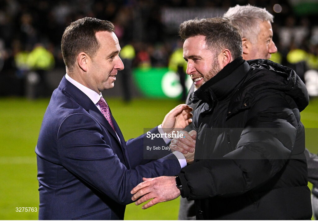 1 November 2025; League of Ireland director Mark Scanlon, left, congratulates Shamrock Rovers manager Stephen Bradley after the SSE Airtricity Men's Premier Division match between Shamrock Rovers and Sligo Rovers at Tallaght Stadium in Dublin. Photo by Seb Daly/Sportsfile