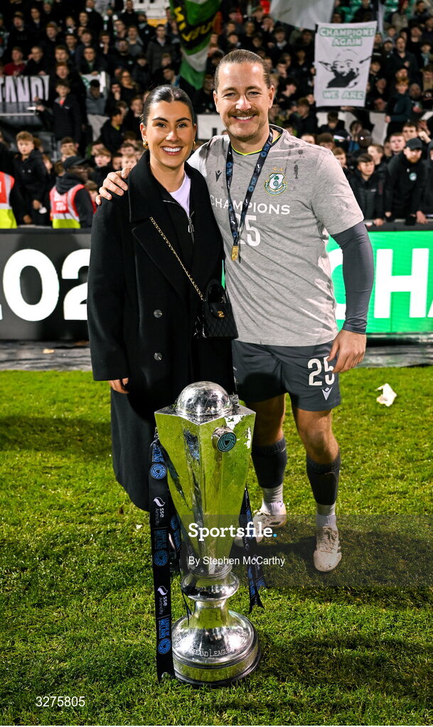 1 November 2025; Shamrock Rovers goalkeeper Lee Stacey and wife Katie celebrate with the SSE Airtricity Men's Premier Division trophy after the SSE Airtricity Men's Premier Division match between Shamrock Rovers and Sligo Rovers at Tallaght Stadium in Dublin. Photo by Stephen McCarthy/Sportsfile