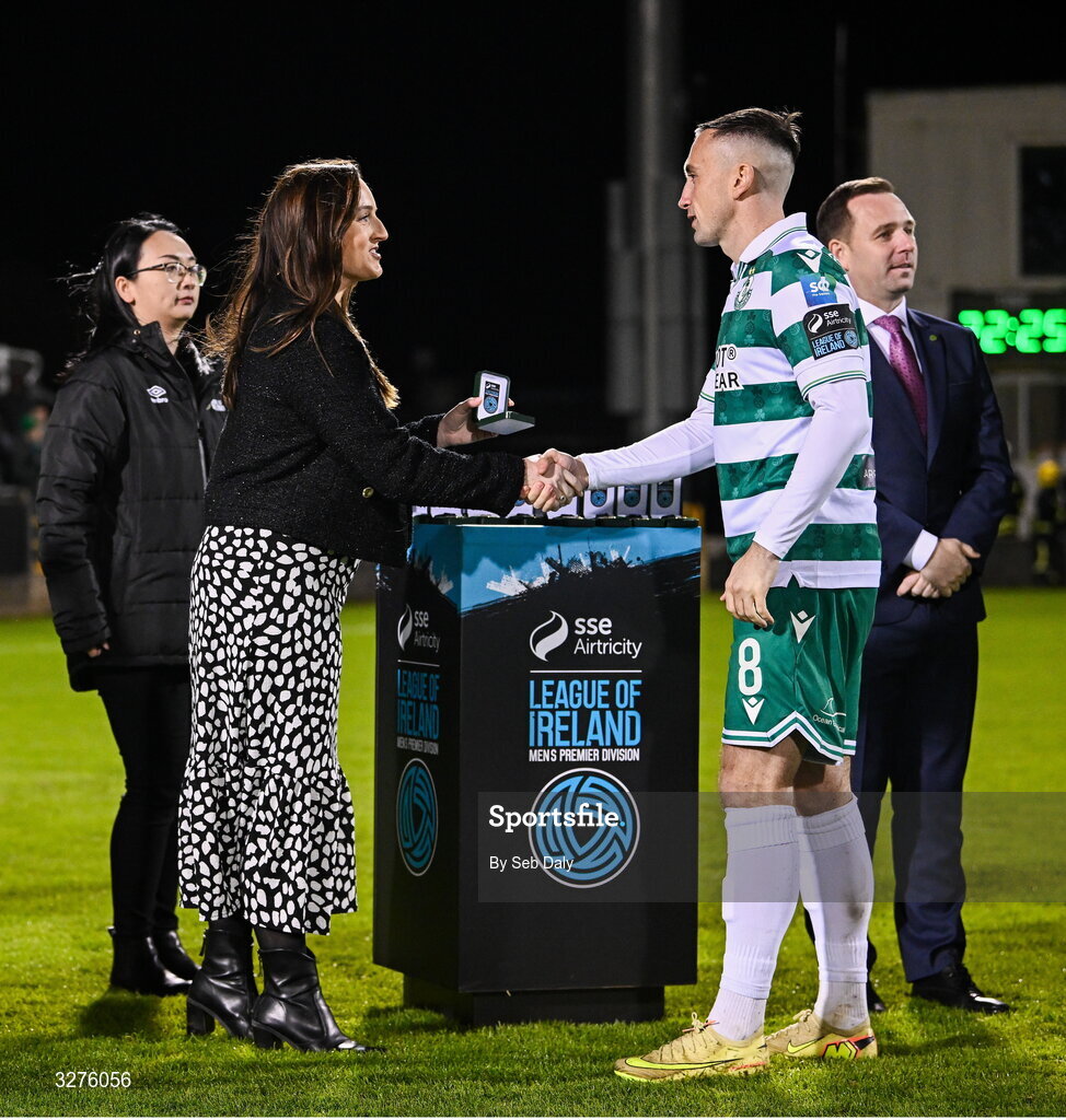 1 November 2025; Aaron McEneff of Shamrock Rovers is presented with his medal by SSE Airtricity Sponsorship Manager Ashley Keating after the SSE Airtricity Men's Premier Division match between Shamrock Rovers and Sligo Rovers at Tallaght Stadium in Dublin. Photo by Seb Daly/Sportsfile