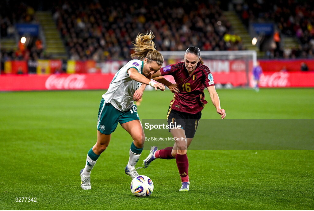 28 October 2025; Kyra Carusa of Republic of Ireland in action against Zenia Mertens of Belgium during the UEFA Women's Nations League A/B promotion/relegation play-off second leg match between Belgium and Republic of Ireland at The King Power At Den Dreef Stadium in Leuven, Belgium. Photo by Stephen McCarthy/Sportsfile