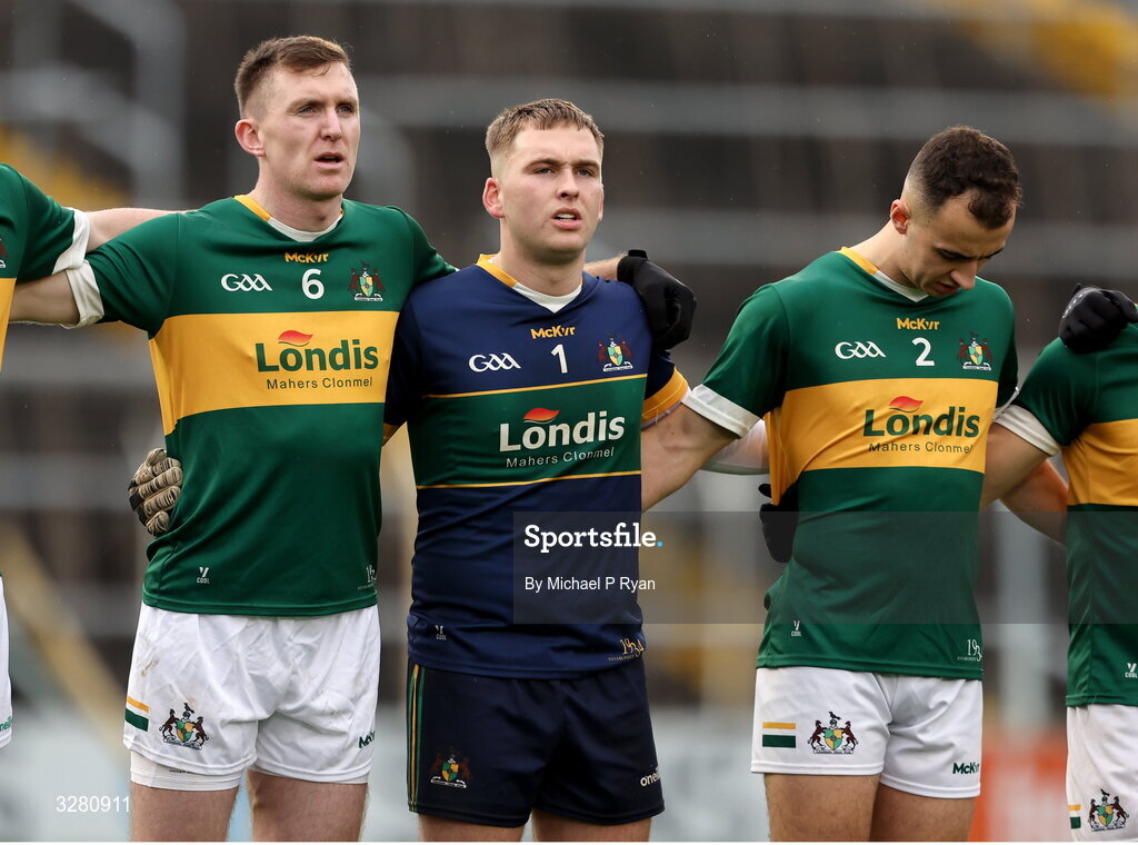 8 November 2025; Clonmel Commercials players, including goalkeeper Shane Ryan, centre, stand for the playing of Amhrán na bhFiann before the Tipperary County Senior Club Football Championship final match between Clonmel Commercials and Kilsheelan-Kilcash at FBD Semple Stadium in Thurles, Tipperary. Photo by Michael P Ryan/Sportsfile