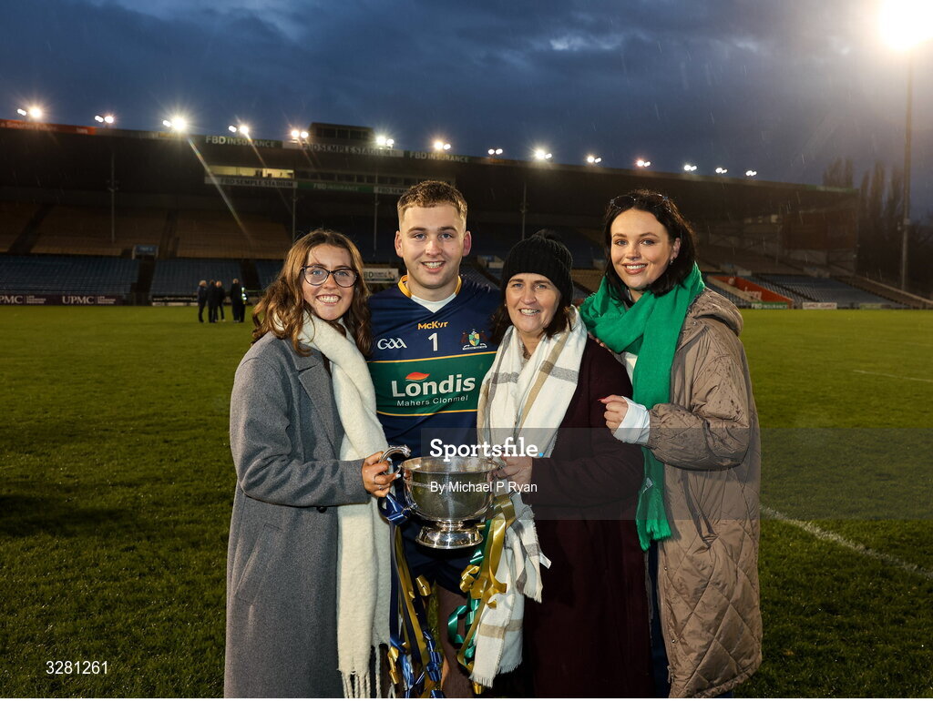 8 November 2025; Clonmel Commercials Shane Ryan pictured with his family, sister Katie, left, mother Anna, and sister Amy, after the Tipperary County Senior Club Football Championship final match between Clonmel Commercials and Kilsheelan-Kilcash at FBD Semple Stadium in Thurles, Tipperary. Photo by Michael P Ryan/Sportsfile