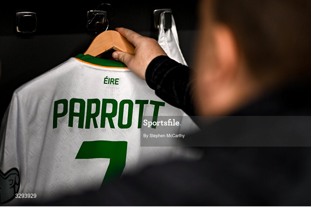 16 November 2025; Republic of Ireland kit and equipment manager Malcolm Slattery hands the jersey of Troy Parrott of Republic of Ireland before the FIFA World Cup 2026 Group F Qualifier match between Hungary and Republic of Ireland at Puskás Aréna in Budapest, Hungary. Photo by Stephen McCarthy/Sportsfile